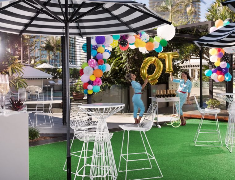 Balloons, umbrellas and fake grass all make this unique outdoor venue